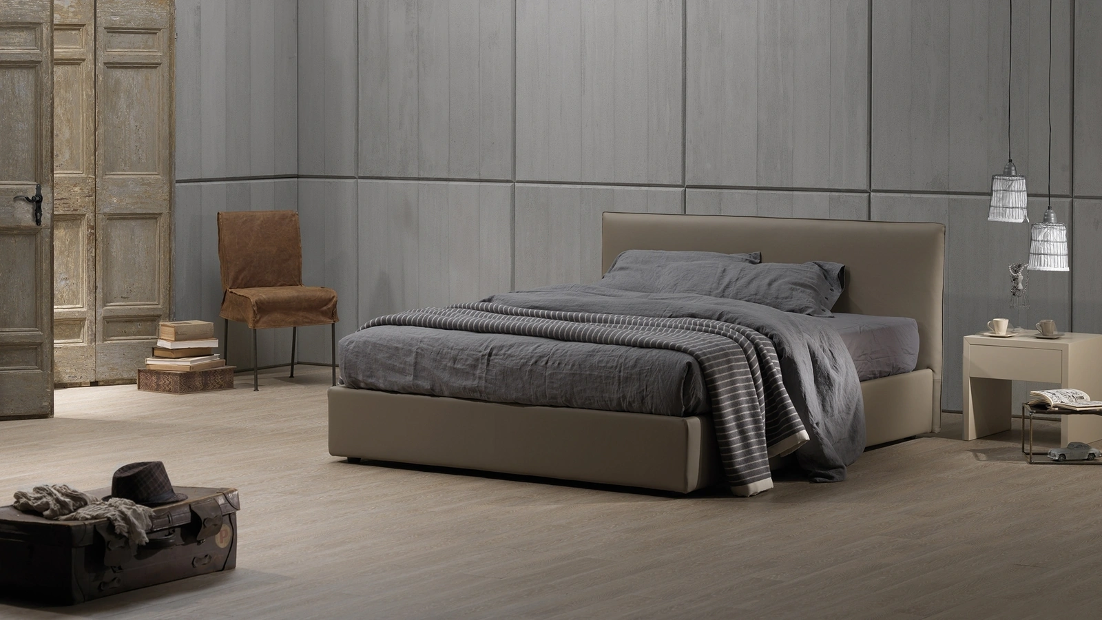 Letto matrimoniale in ecopelle Zizuzi 28 con box contenitore e testiera di Excò