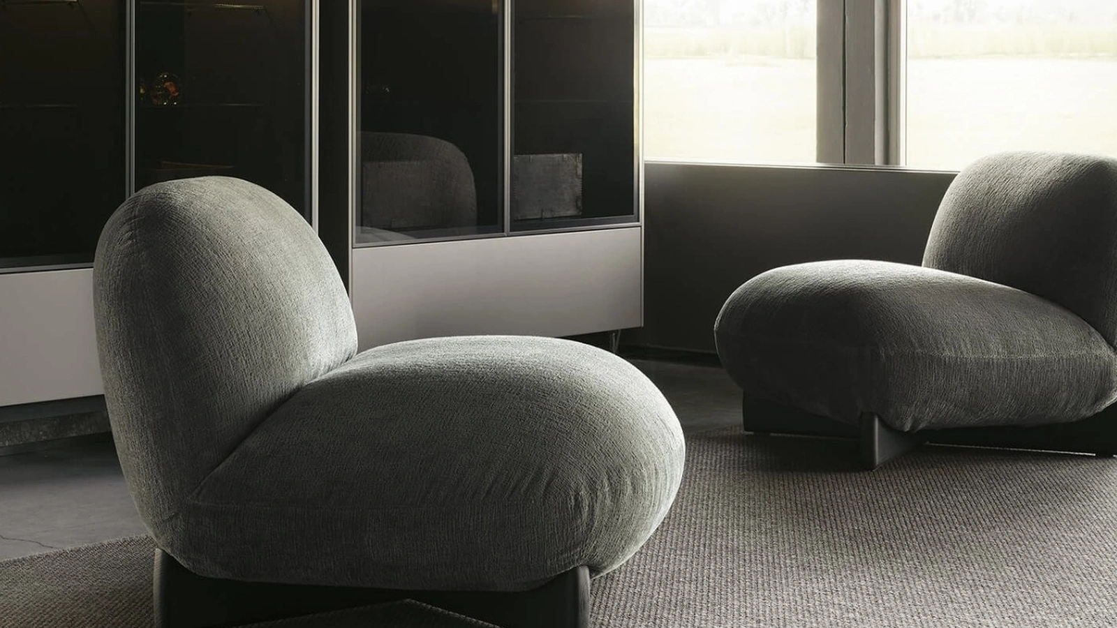 Poltrona in tessuto imbottito Hasu di Lema