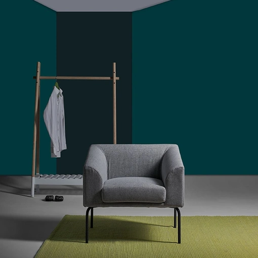 Poltroncina in tessuto con struttura in metallo Lavra di Excò