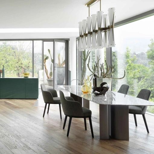 Tavolo in marmo con base scultorea in metallo Gullwing di Lema